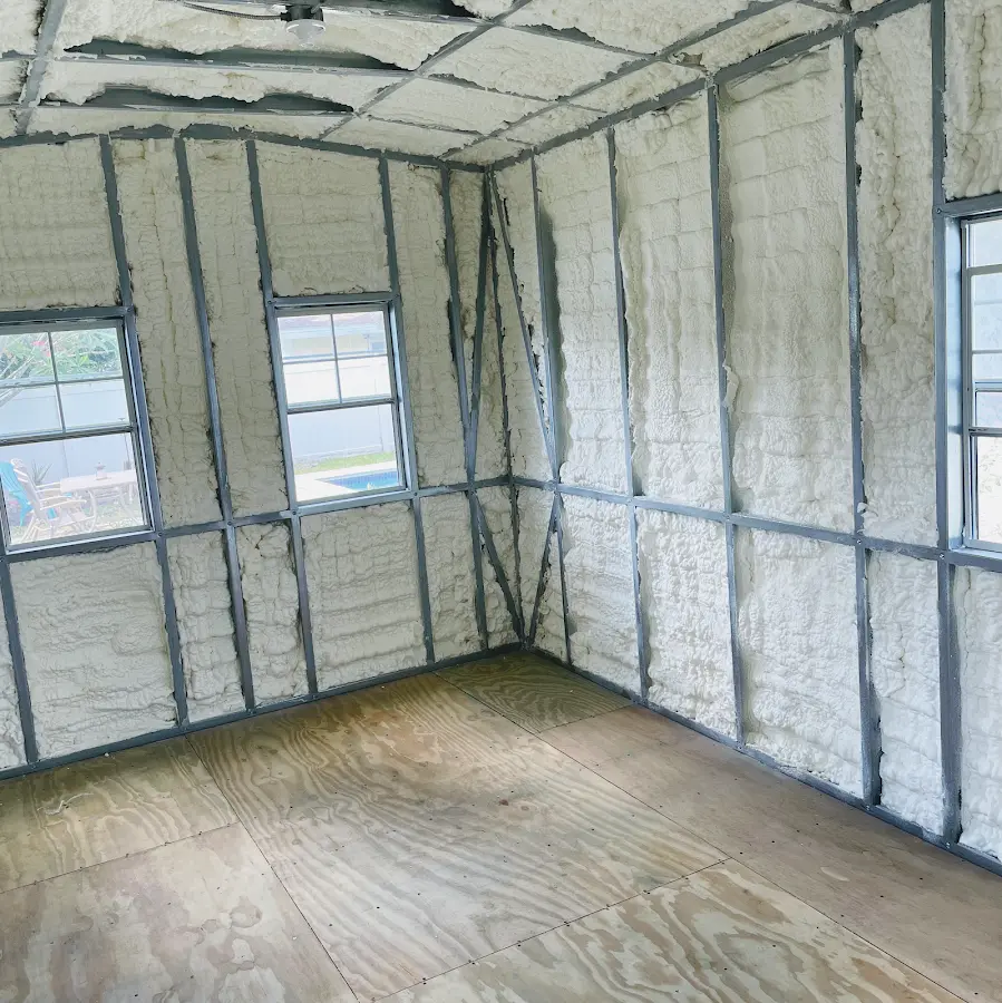 Closed-cell spray foam insulation applied to wall cavities in a residential project in Point Pleasant